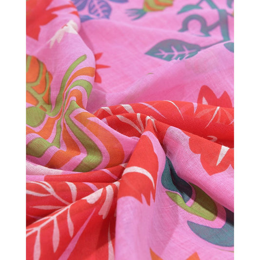 Close-up of colorful fabric with abstract patterns on a pink background